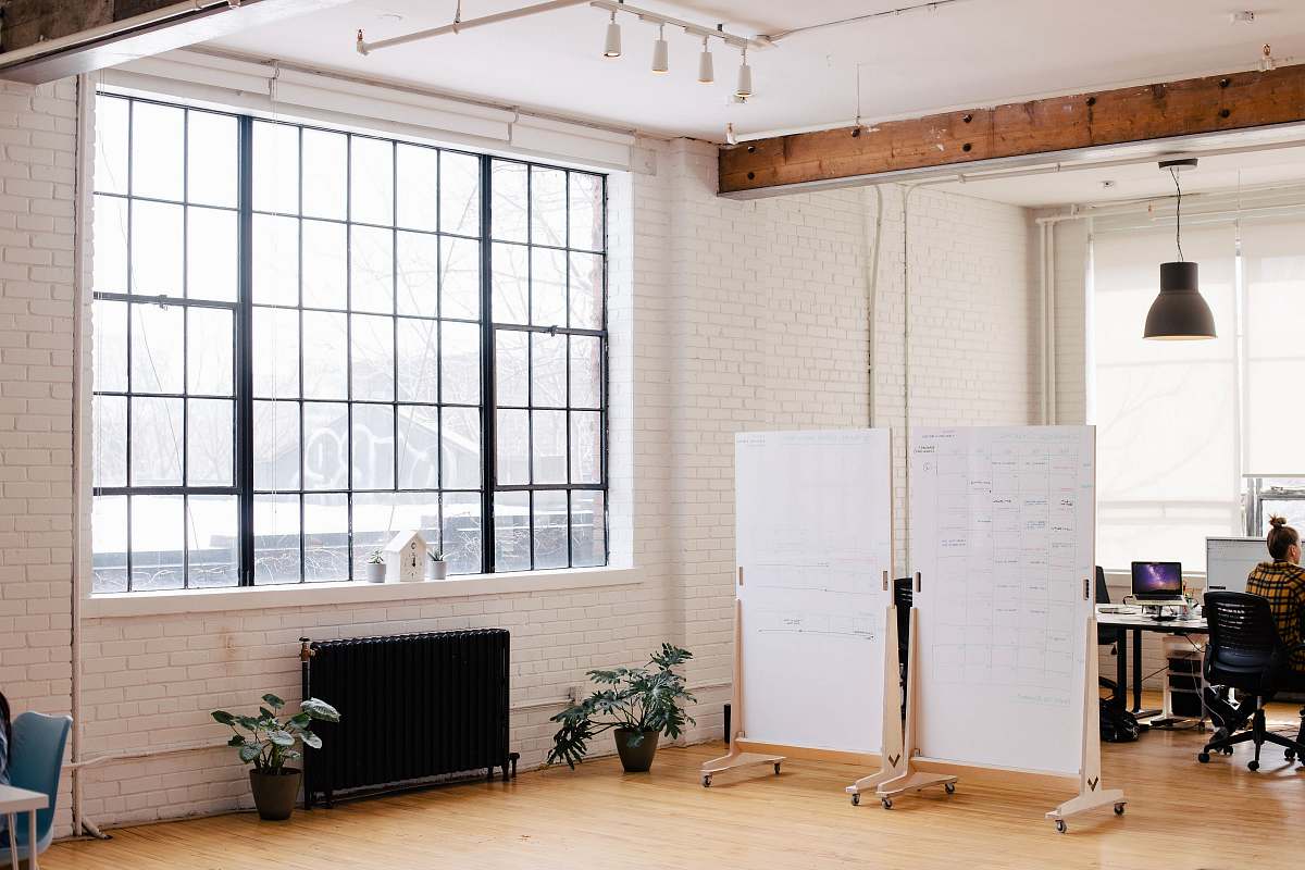 interior design two white projector screens across room indoors